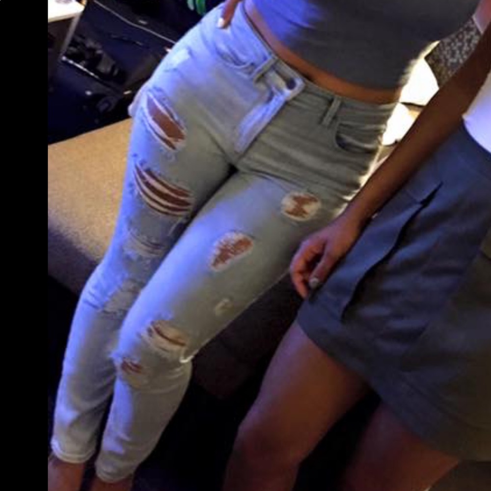 Highly distressed light jeans